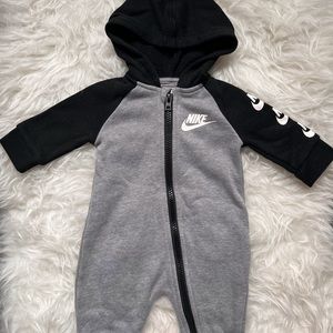 Nike sweatsuit one piece size 3 months. Great condition perfect for cold months.